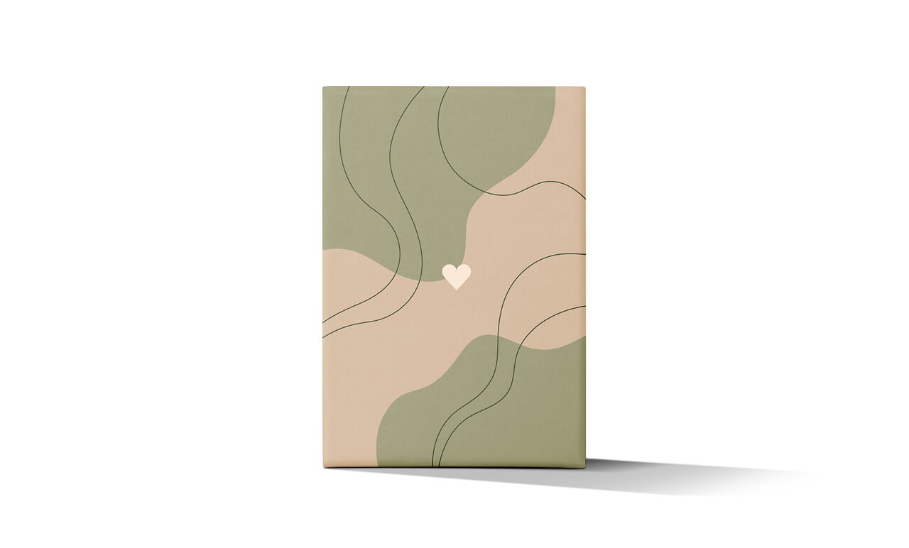 Un livre photo stylé avec des lignes modernes et courbées dans des tons terreux doux
