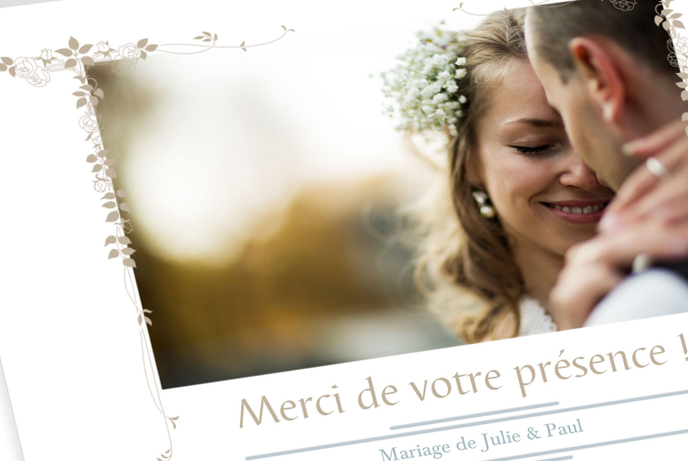 Carte de mariage avec des décorations florales et le texte 'Merci de votre présence'.