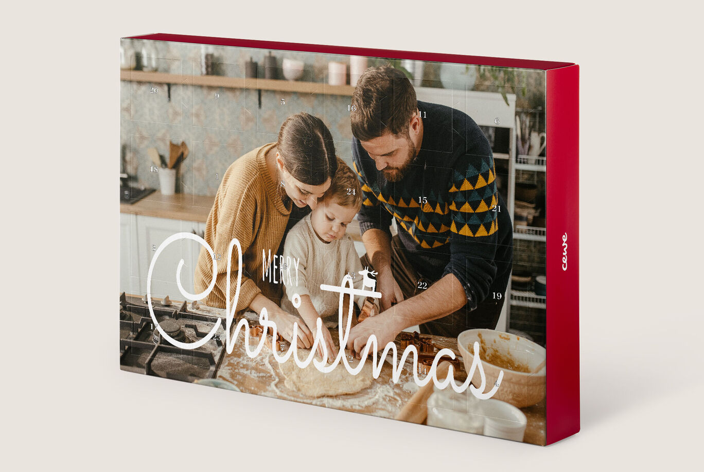 Un couple cuit des biscuits dans une cuisine accueillante pendant Noël