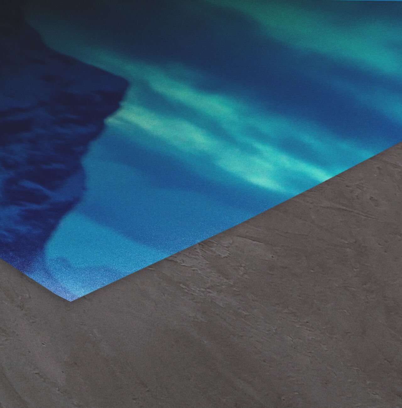 Gros plan d'une surface mate avec des nuances douces de bleu et de vert