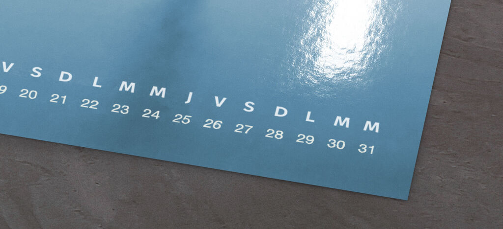 Calendrier coloré avec un fond vert vif et des chiffres blancs de 1 à 31.